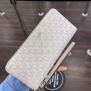 MK JET SET LG TRAVEL CONTINENTAL WALLET GREY